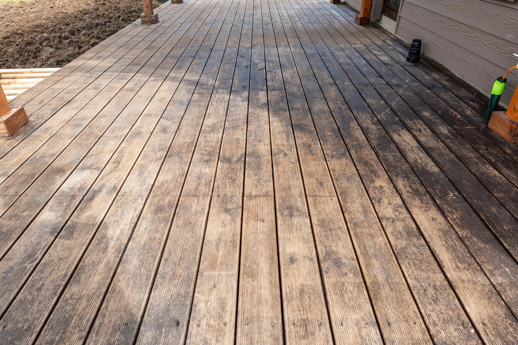 Wooden deck with sunlight patterns